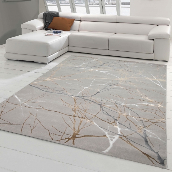 Designer Teppich mit abstraktem glänzenden Ästemuster gold