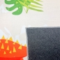 Preview: Rutschfester Kinderzimmerteppich mit Dinomuster in Beige