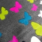 Preview: Farbenfoher Kinderzimmer-Schmetterlingsteppich in grau