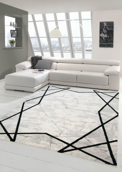 Moderner Marmorteppich mit abstraktem Muster in creme schwarz