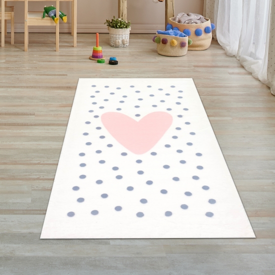 Kinderzimmer Teppich flauschig rosa Herz graue Punkte in creme