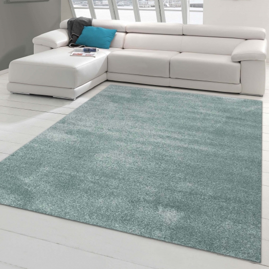 Moderner Designer Wohnzimmer-Teppich im Uni Design in hellblau