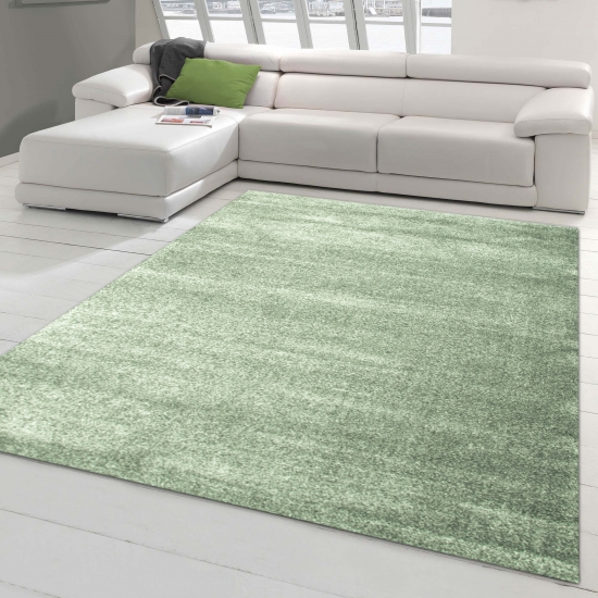 Moderner Designer Wohnzimmer-Teppich im Uni Design in mint