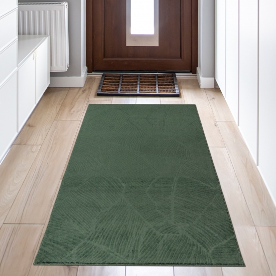 Kuschliger Teppich mit schönem Blättermuster in grün
