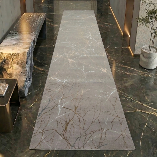 Designer Teppich mit abstraktem glänzenden Ästemuster gold