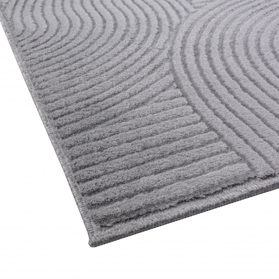 Kuschliger Teppich mit schönem Linienmuster in grau