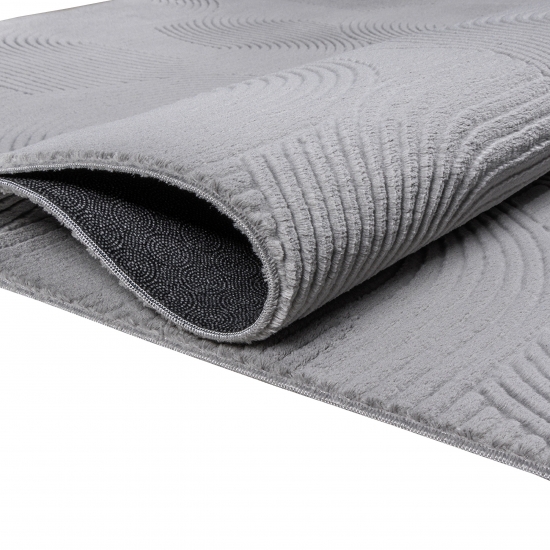 Kuschliger Teppich mit schönem Linienmuster in grau