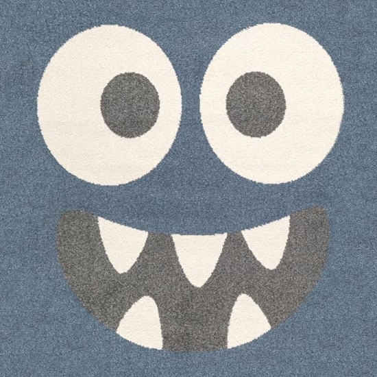 Kinderteppich in Blau mit fröhlichem Monster