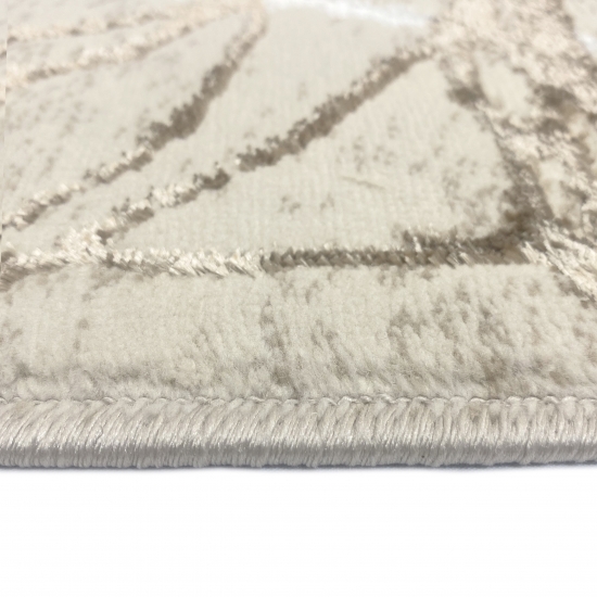 Designer Teppich mit abstraktem glänzenden Ästemuster creme