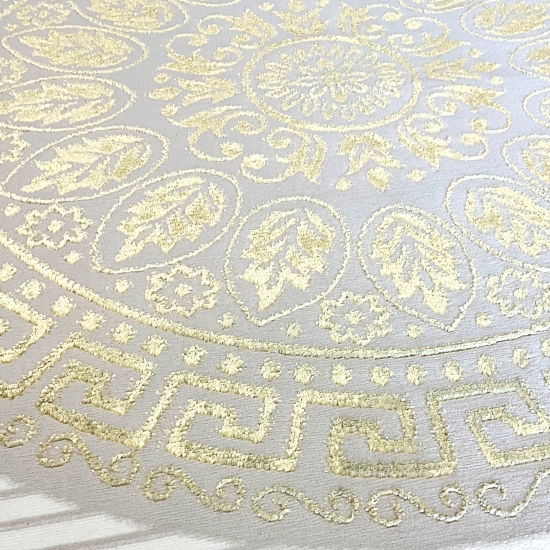 Orientalischer Designerteppich mit glänzendem Ornament in weiß-gold