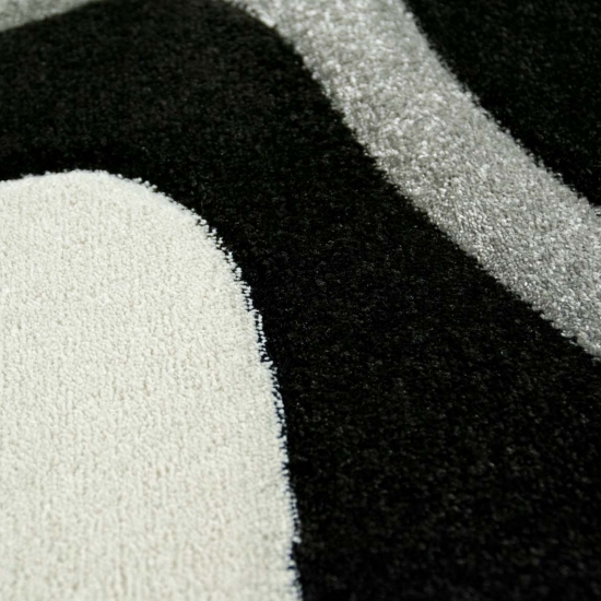 Designer Wohnzimmer Teppich | Wellenmuster | in schwarz grau weiß