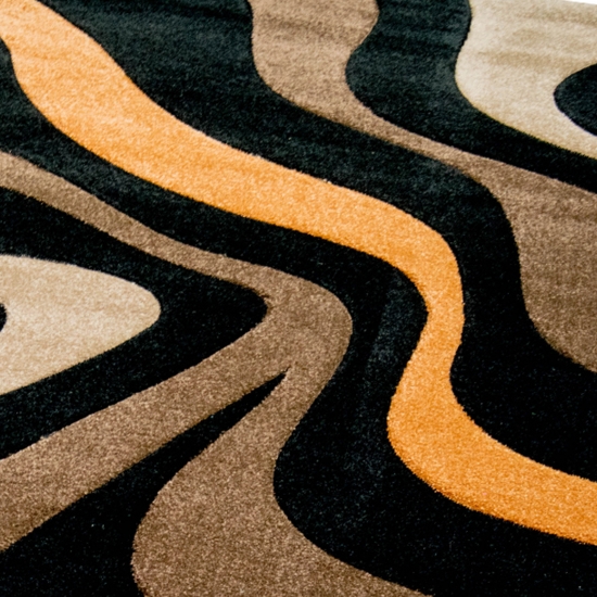 Pflegeleichter Teppich mit Wellenoptik in schwarz-braun