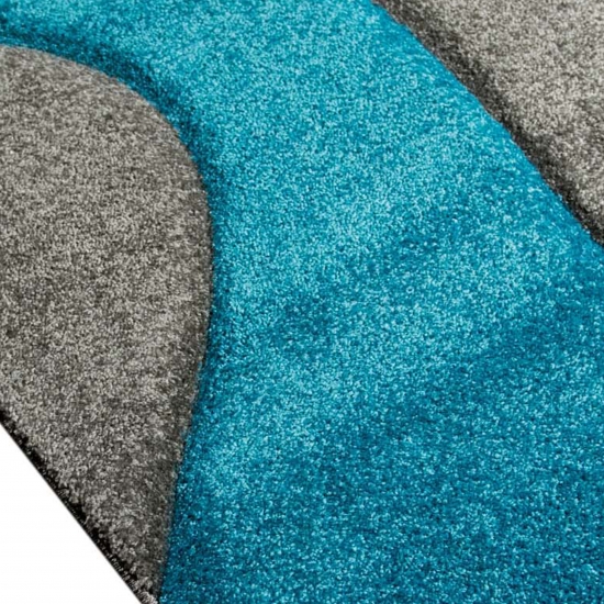 Preview: Teppich mit Wellenmuster | pflegeleicht | in türkis grau weiß Preview: Teppich mit Wellenmuster | pflegeleicht | in türkis grau weiß