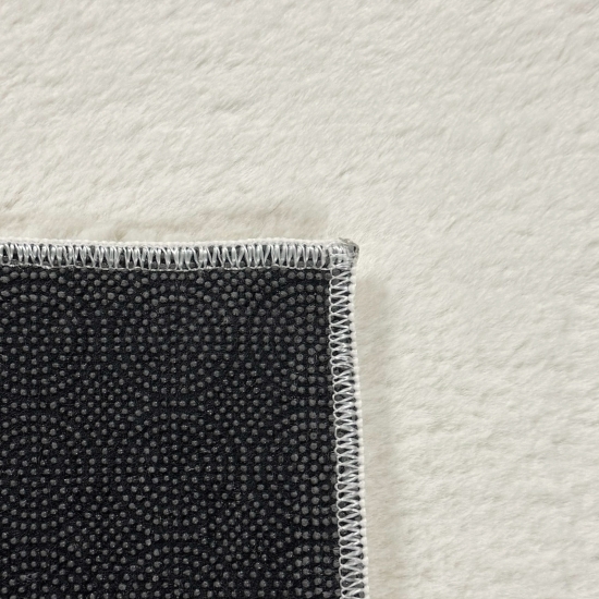 Teppich Creme mit Antirutsch-Rücken und weicher Oberfläche