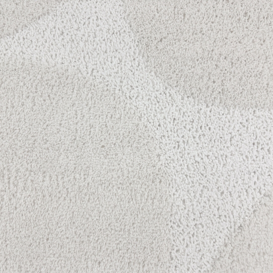 Moderner Hochflor Teppich mit organischem Muster in Creme