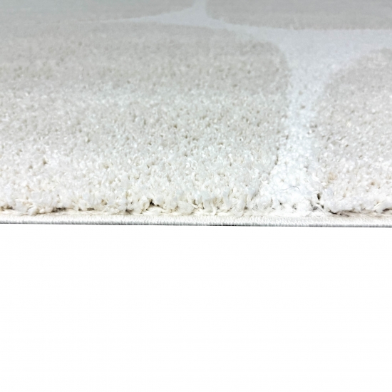 Moderner Hochflor Teppich mit organischem Muster in Creme