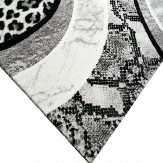 Moderner Teppich Leopardenmuster Grau Schwarz Creme fürs Zuhause