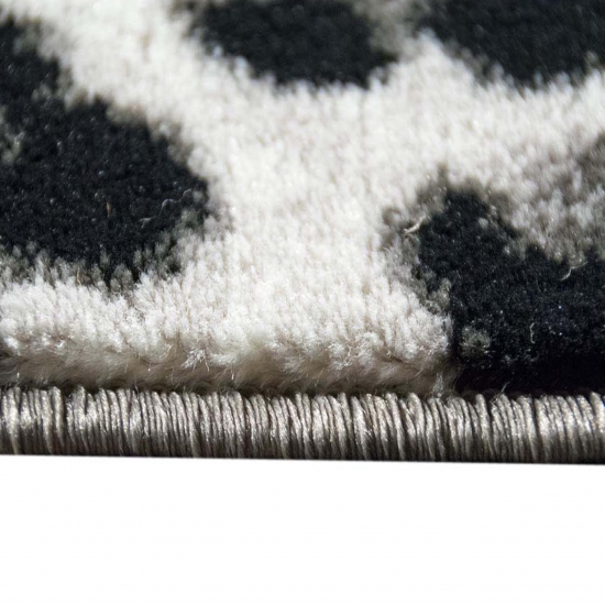 Moderner Teppich Leopardenmuster Grau Schwarz Creme fürs Zuhause