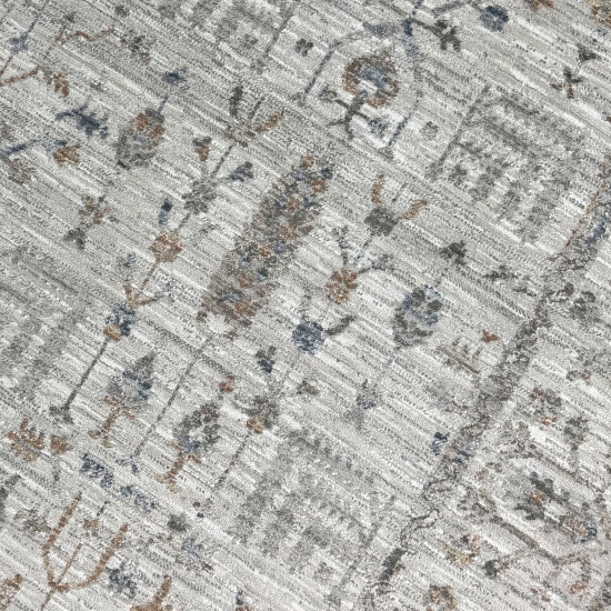 Teppich Creme mit floraler Ornamentik, Fransen und modernem Design