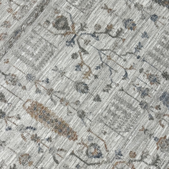 Teppich Creme mit floraler Ornamentik, Fransen und modernem Design