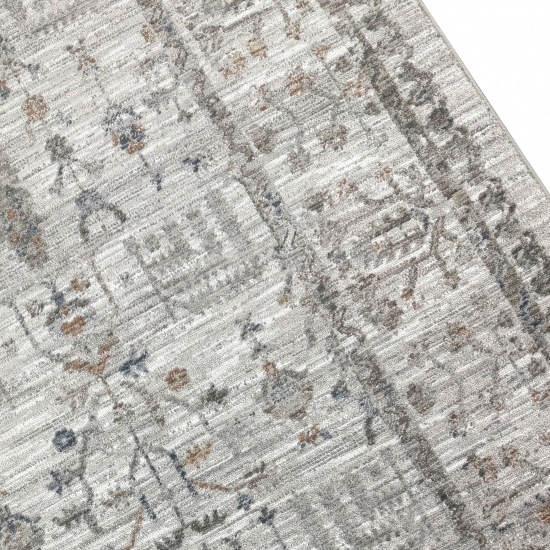 Teppich Creme mit floraler Ornamentik, Fransen und modernem Design