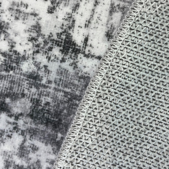 Grauer Teppich mit Vintage-Medaillon und ruhiger Musterwirkung