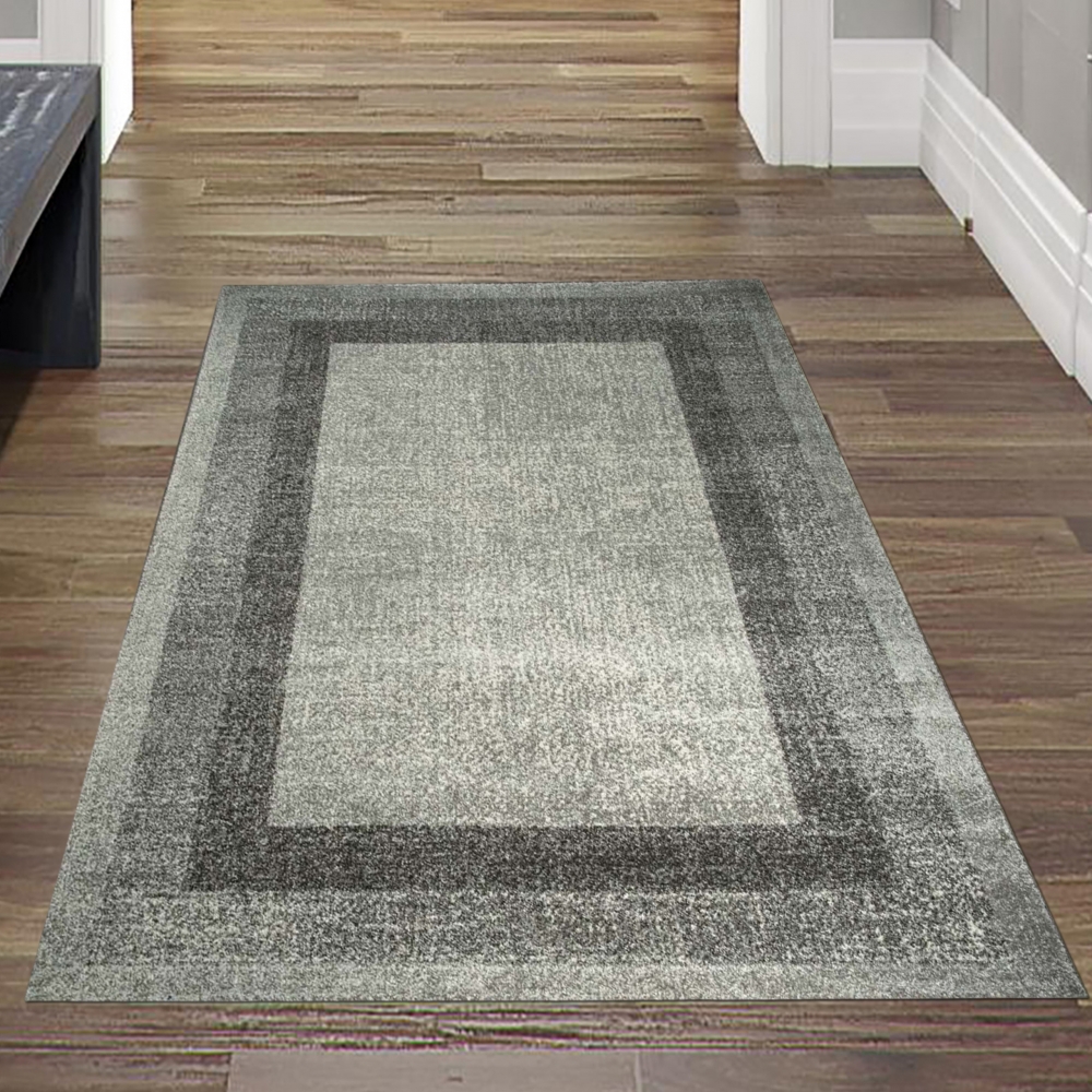Designer Wohnzimmer Teppich Modern kurzflor vintage seitlich gekettelt in grau creme