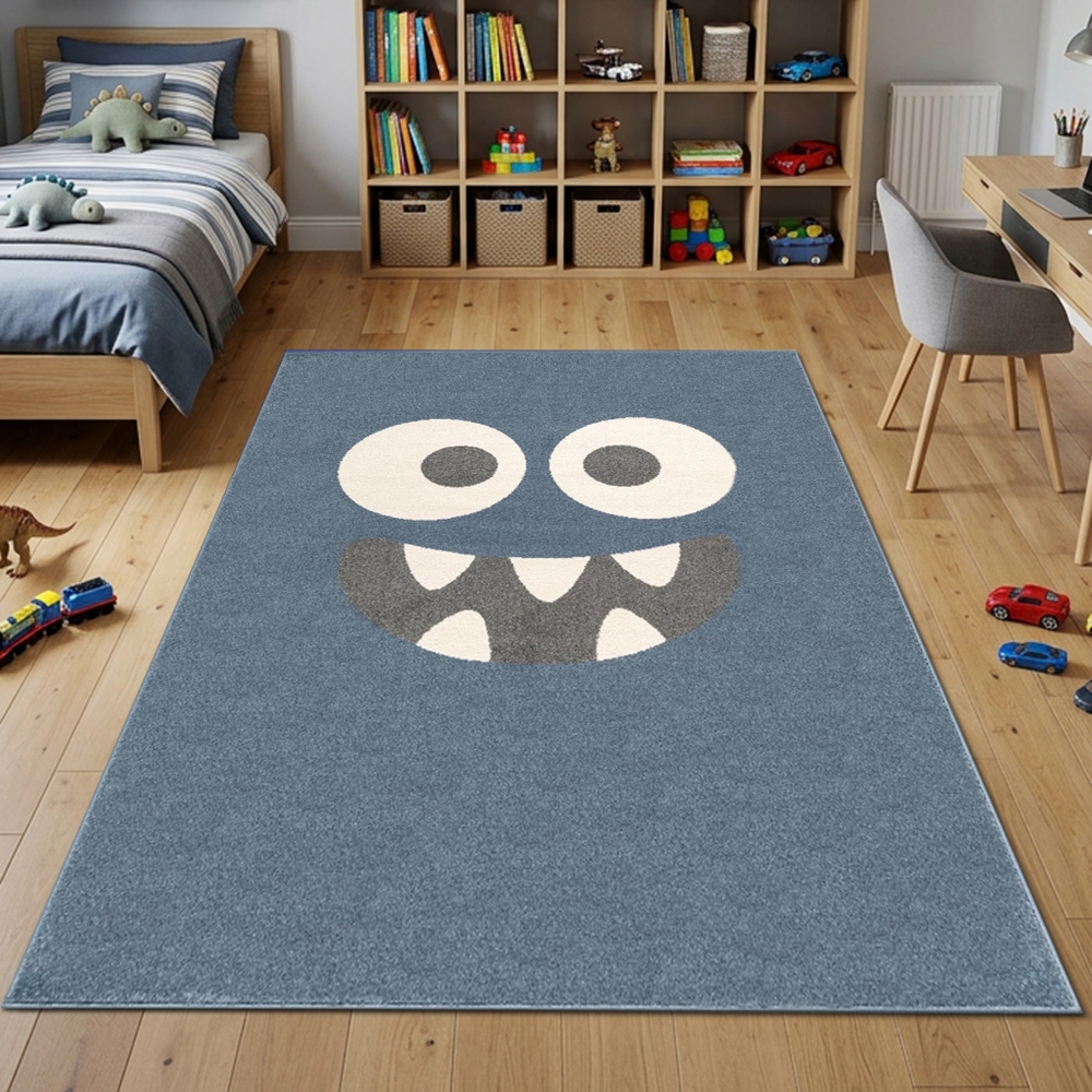 Kinderteppich in Blau mit fröhlichem Monster