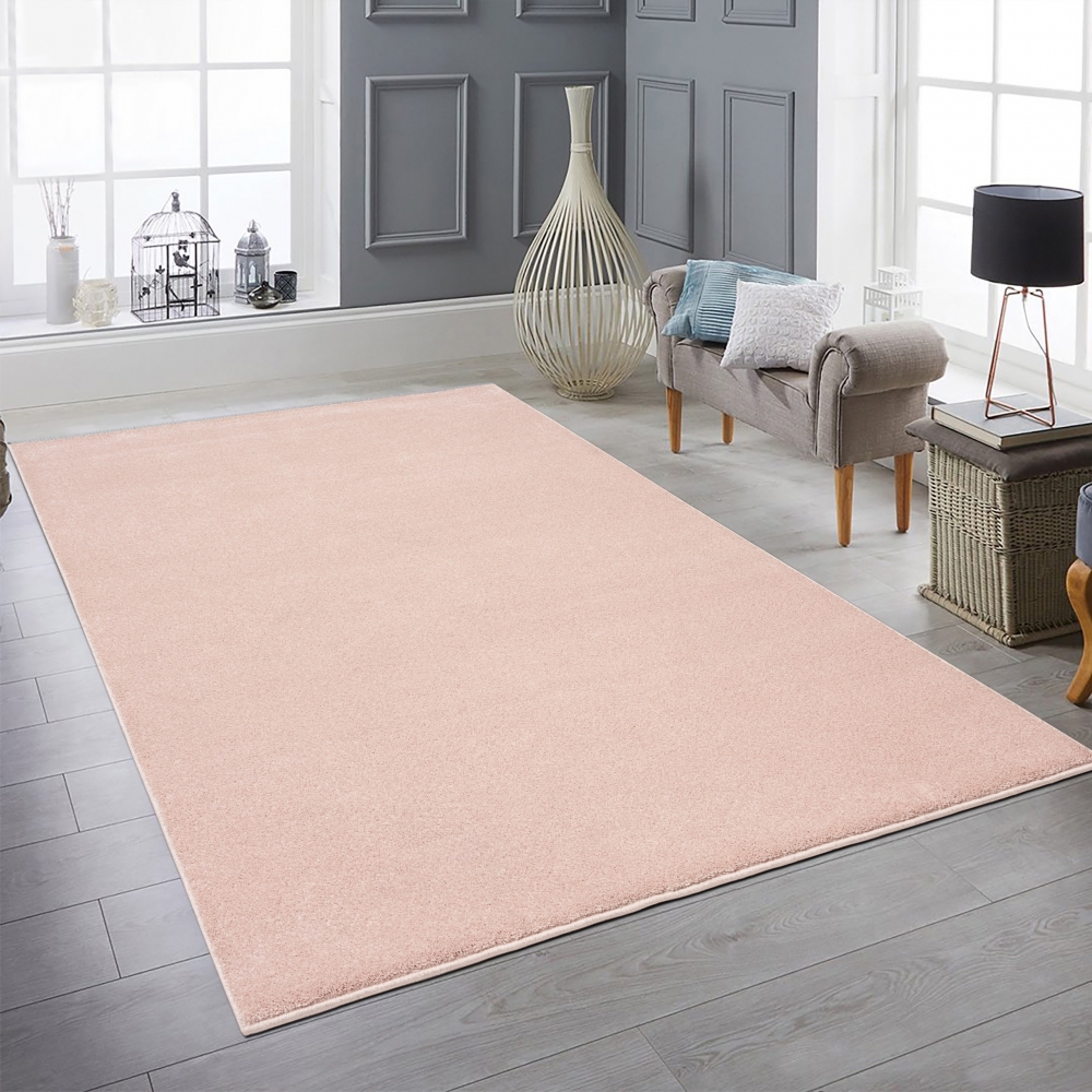 Wohnzimmer Teppich modern Kurzflor mit Uni Design in Rosa