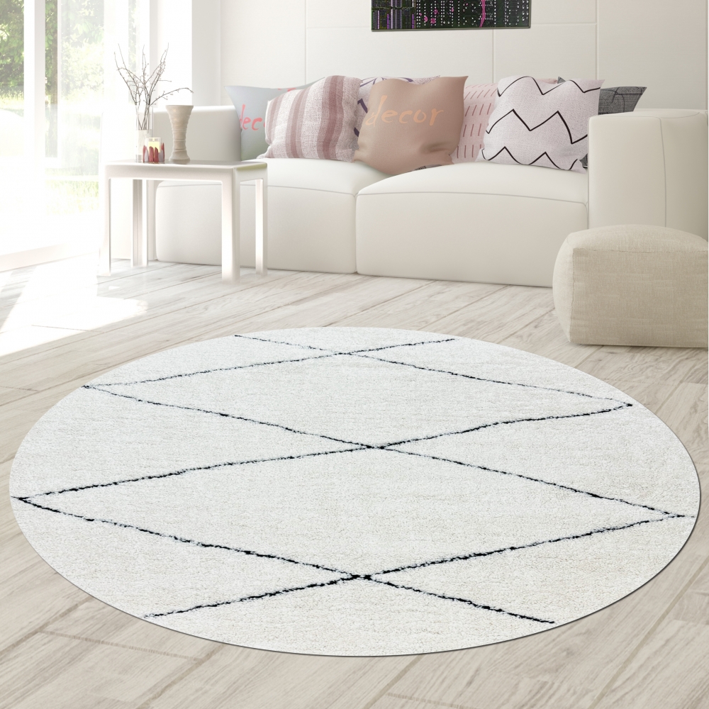 Skandinavische Eleganz: Moderner Teppich mit Rautenmuster in Weiß und Schwarz für zeitlose Wohnkultur
