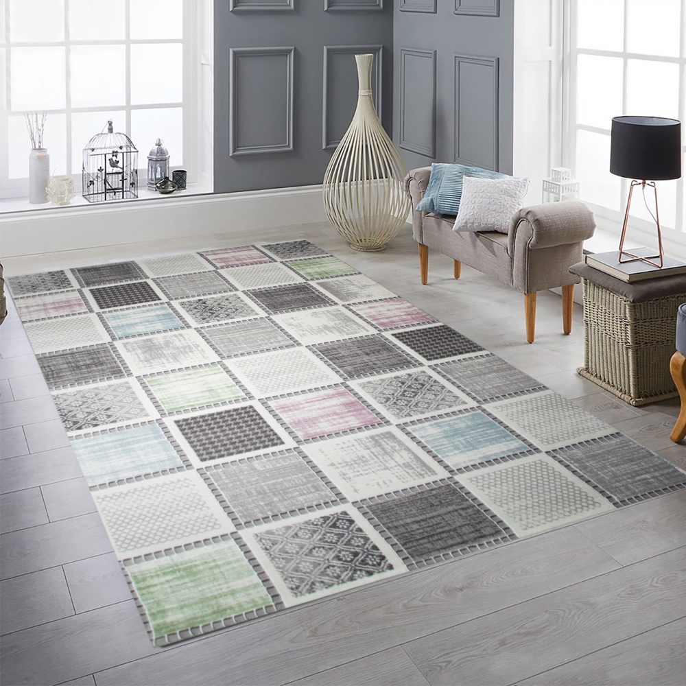 Moderner Kurzflorteppich mit grafischem Patch-Design Grau mit dezenten Farbakzenten