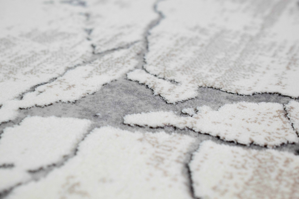 Moderner Marmorteppich mit abstraktem Muster in creme braun