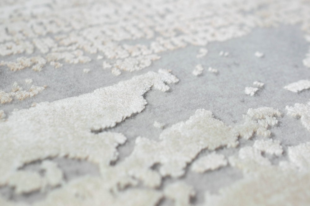 Wollteppich Designerteppich Teppich abstrakt aus Naturfasern in beige grau