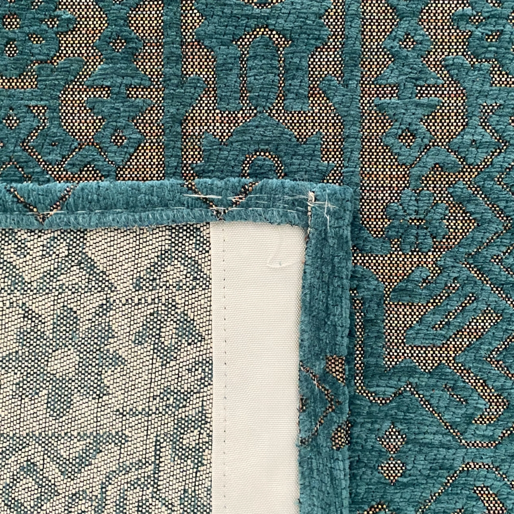 Marokkanischer Teppich mit Ornamenten in petrol - gold