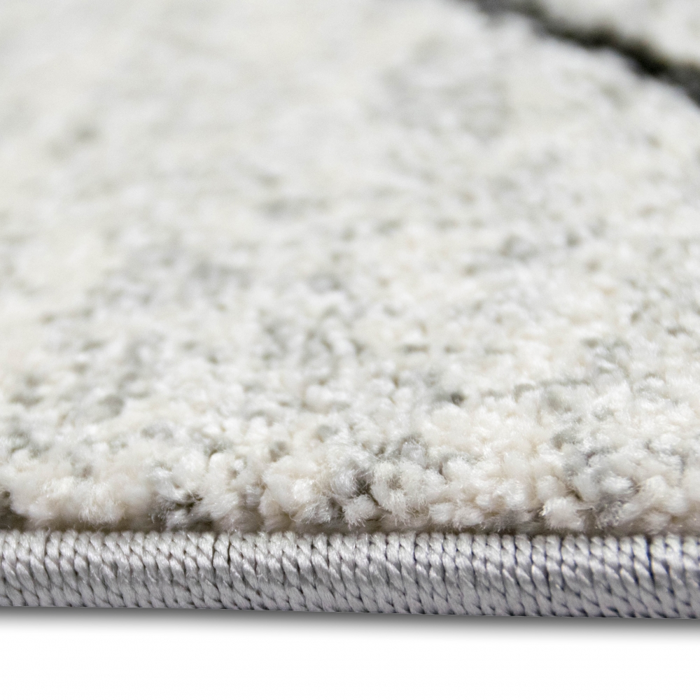Moderner Teppich Creme Grau Rautenmuster weich Wohnzimmer stilvoll