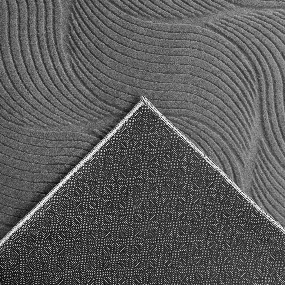 Kuschliger Teppich mit schönem Wellenmuster in anthrazit