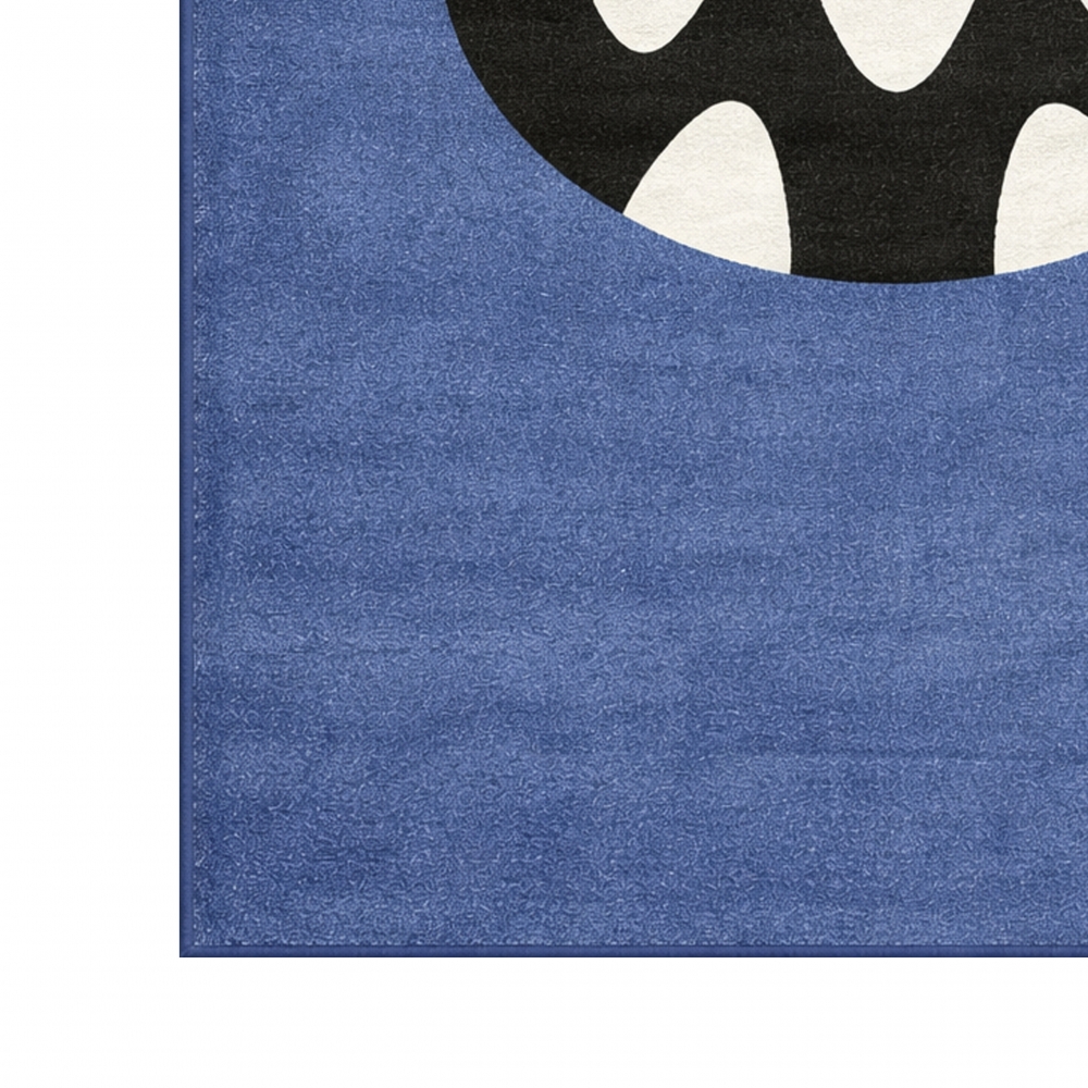 Runder Kinderteppich in Blau mit fröhlichem Monster