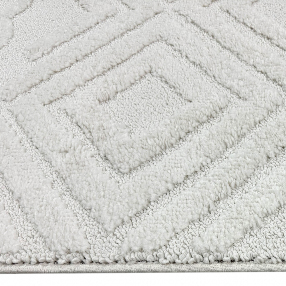 Boho Wohnzimmerteppich mit Rauten und Kreisen in Creme