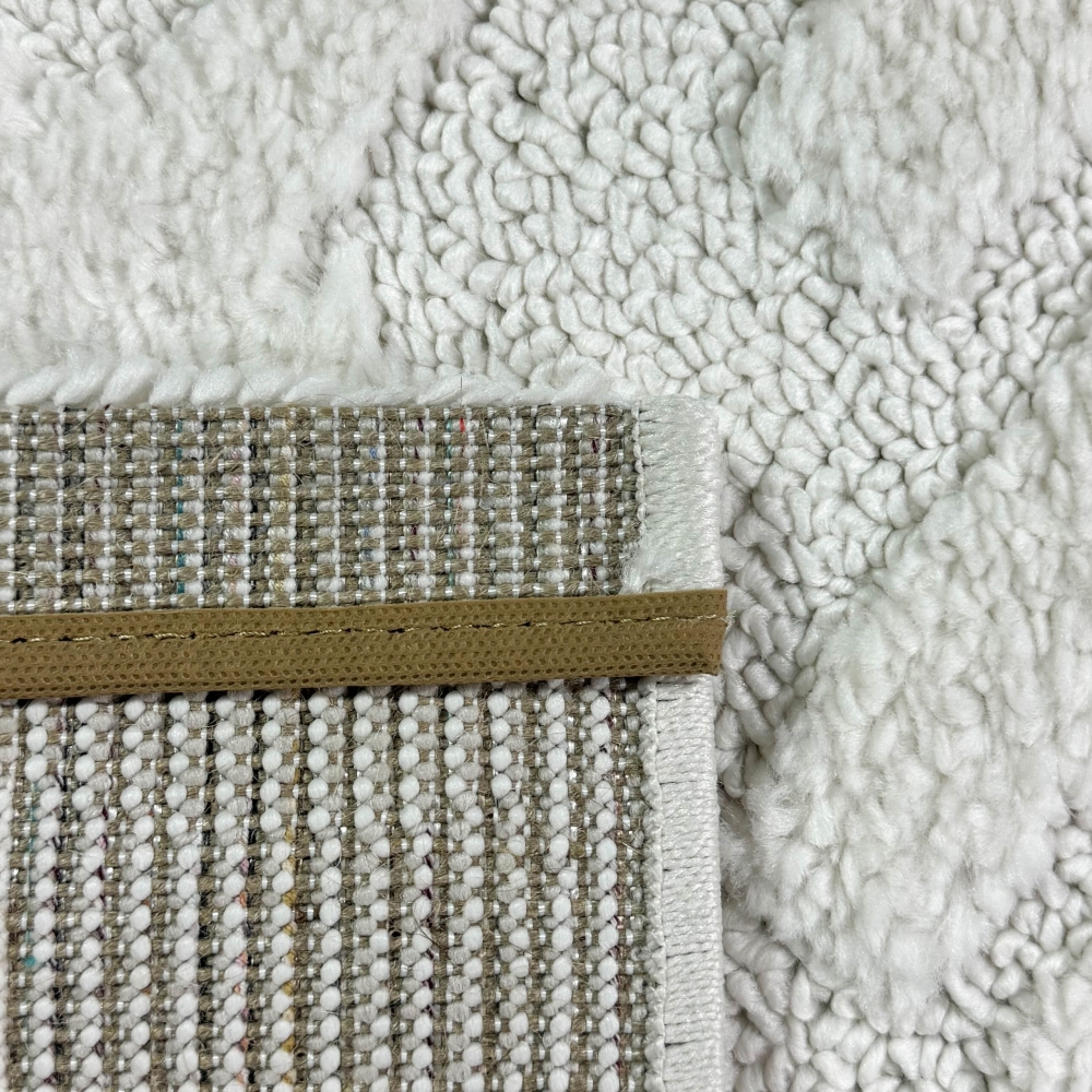 Boho Wohnzimmerteppich mit Rauten und Kreisen in Creme