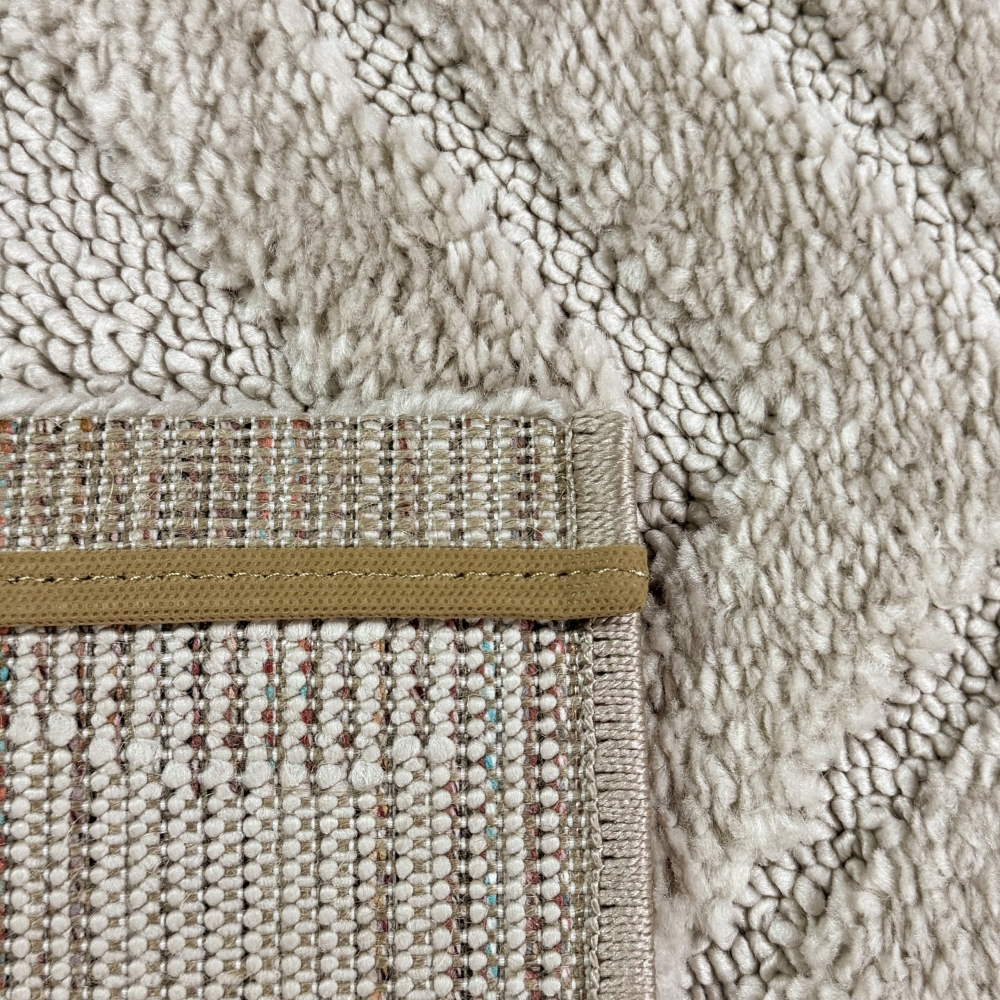 Wohnzimmerteppich Boho Style gemustert mit Rauten und Kreisen in Beige