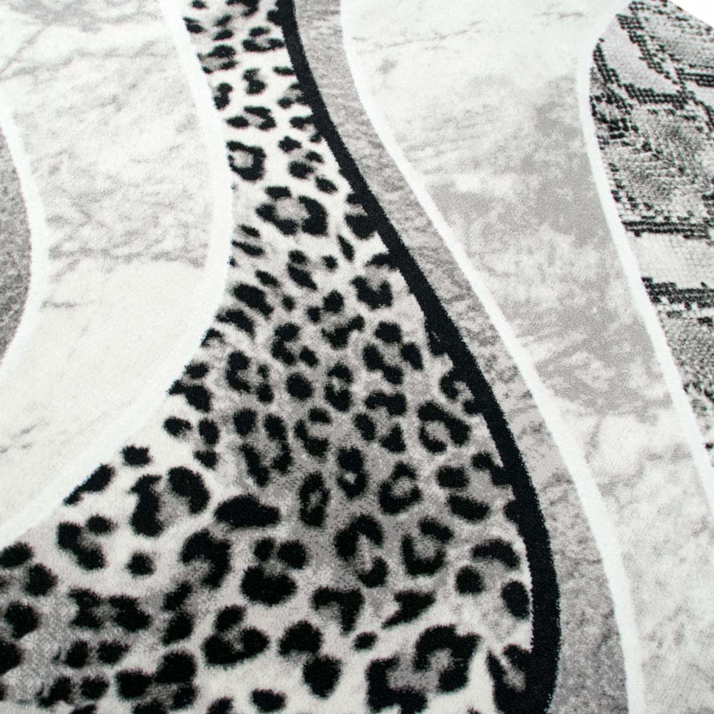 Moderner Teppich Leopardenmuster Grau Schwarz Creme fürs Zuhause