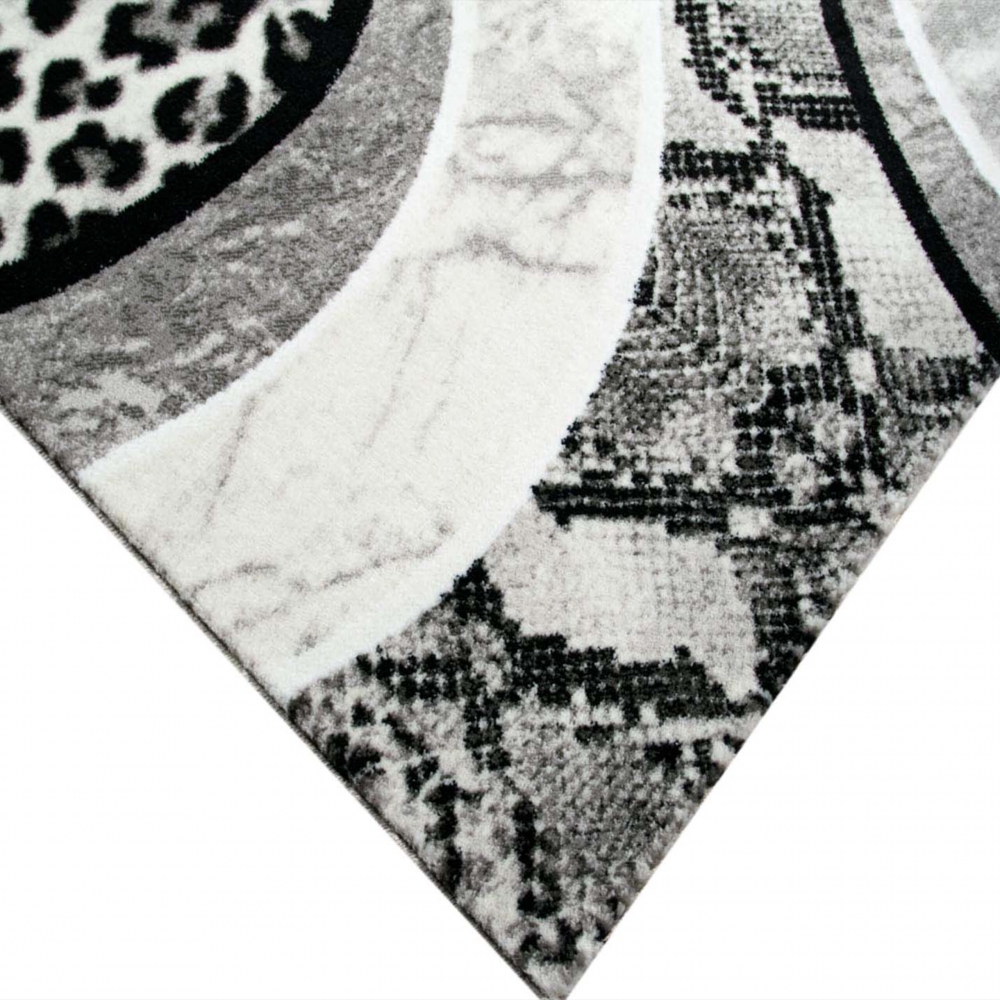 Moderner Teppich Leopardenmuster Grau Schwarz Creme fürs Zuhause