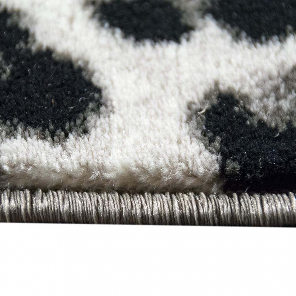 Moderner Teppich Leopardenmuster Grau Schwarz Creme fürs Zuhause
