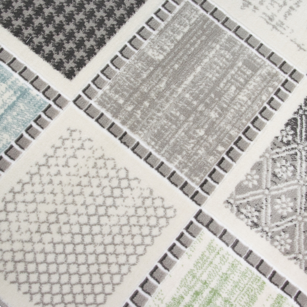 Moderner Kurzflorteppich mit grafischem Patch-Design Grau mit dezenten Farbakzenten
