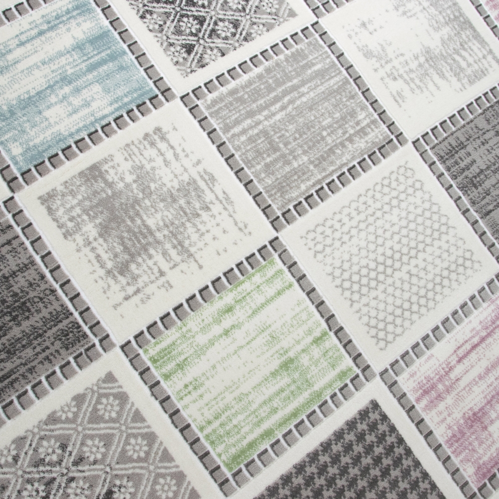 Moderner Kurzflorteppich mit grafischem Patch-Design Grau mit dezenten Farbakzenten