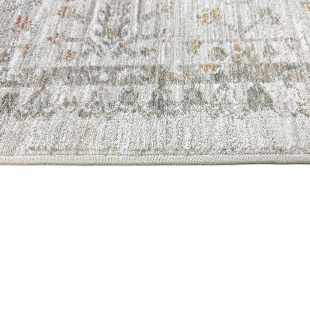 Teppich Creme mit floraler Ornamentik, Fransen und modernem Design