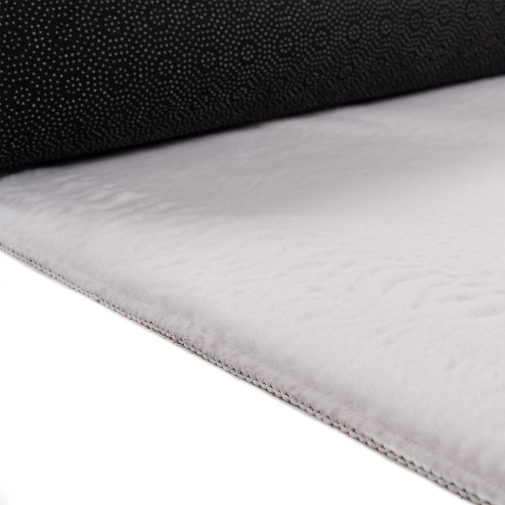 Teppich weiß samtig weich Hasenfell-Optik mit sanftem Glanz