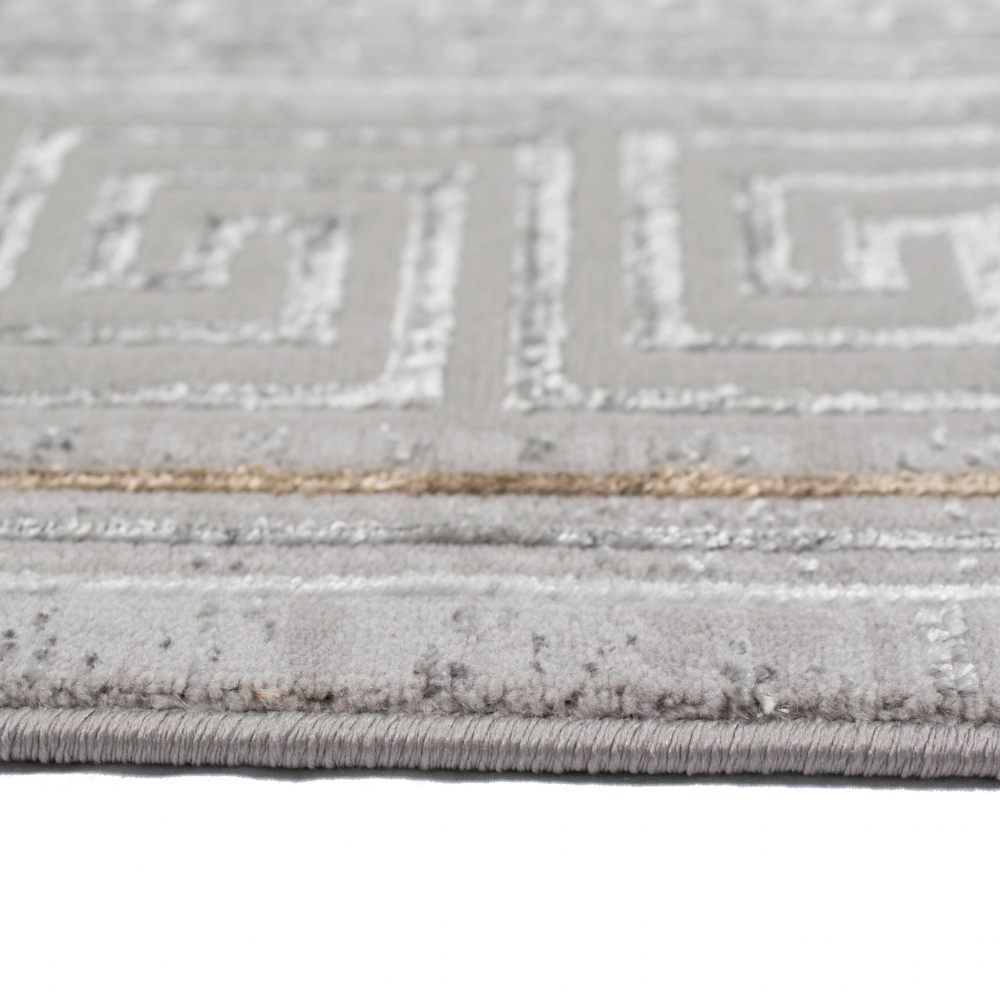Schlichter Teppich mit dezenten orientalischen Mustern in grau
